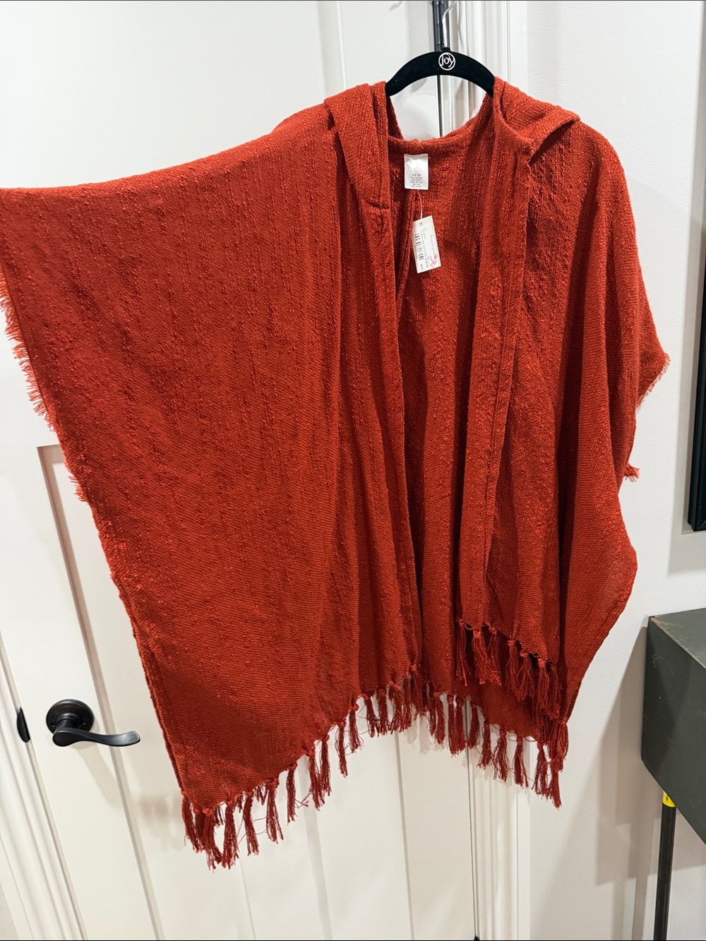Rust Red Hooded Fringe shrug from Francesca’s